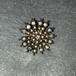 gold and silver brooch